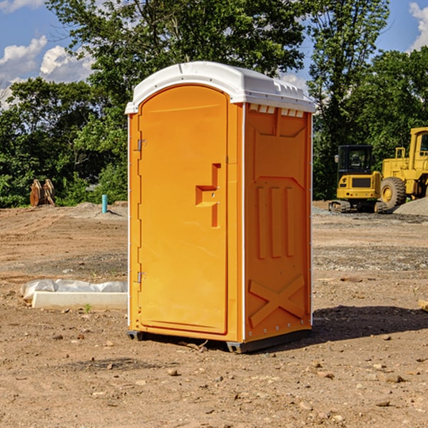 how often are the portable restrooms cleaned and serviced during a rental period in Jackson